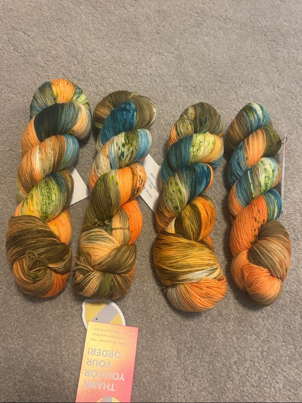The Lemonade Shop Mighty Sock in “Grumpy”. Four skeins